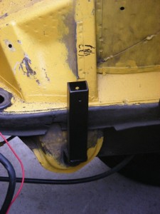 Rear battery rack support post